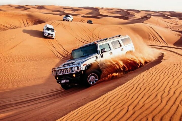 Experience the thrill of dune bashing across Dubai's stunning sand dunes where adventure meets desert beauty offering unforgettable memories and a taste of local culture.